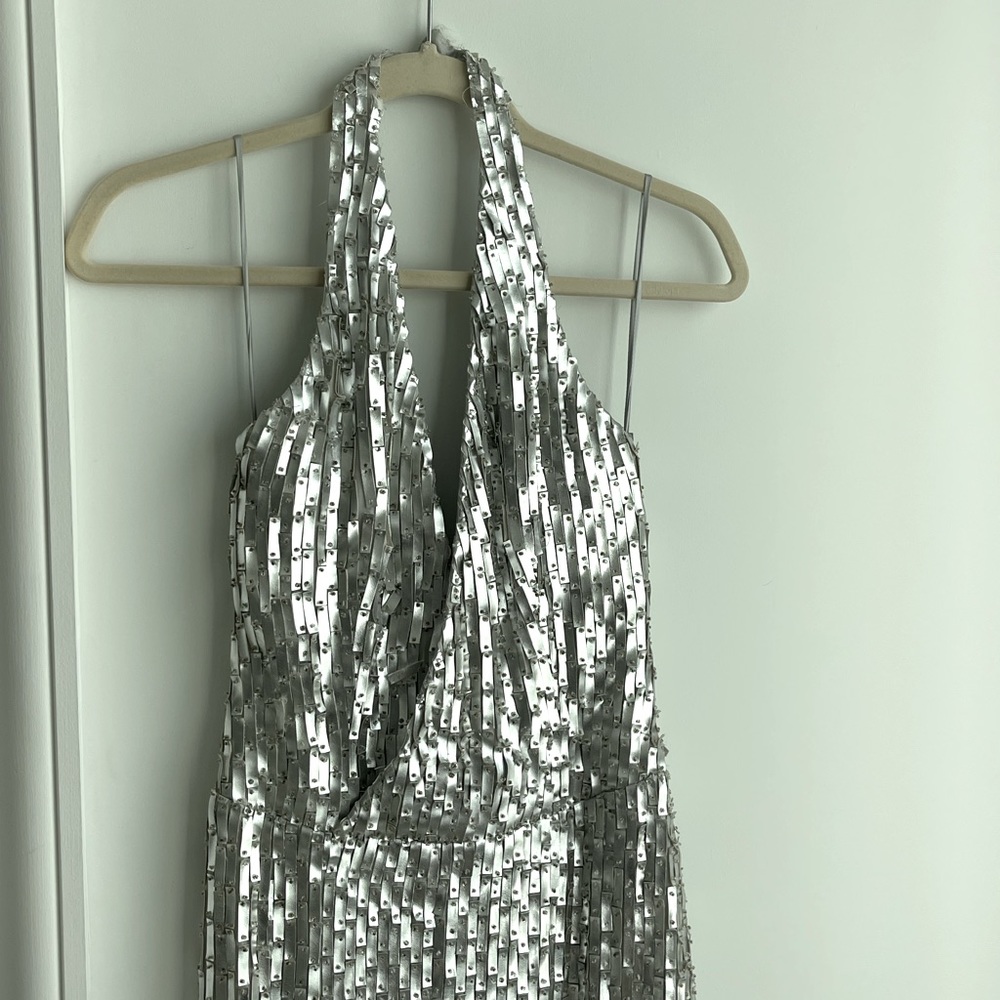 CD Greene Silver Faux Leather detailed halter gown with slit